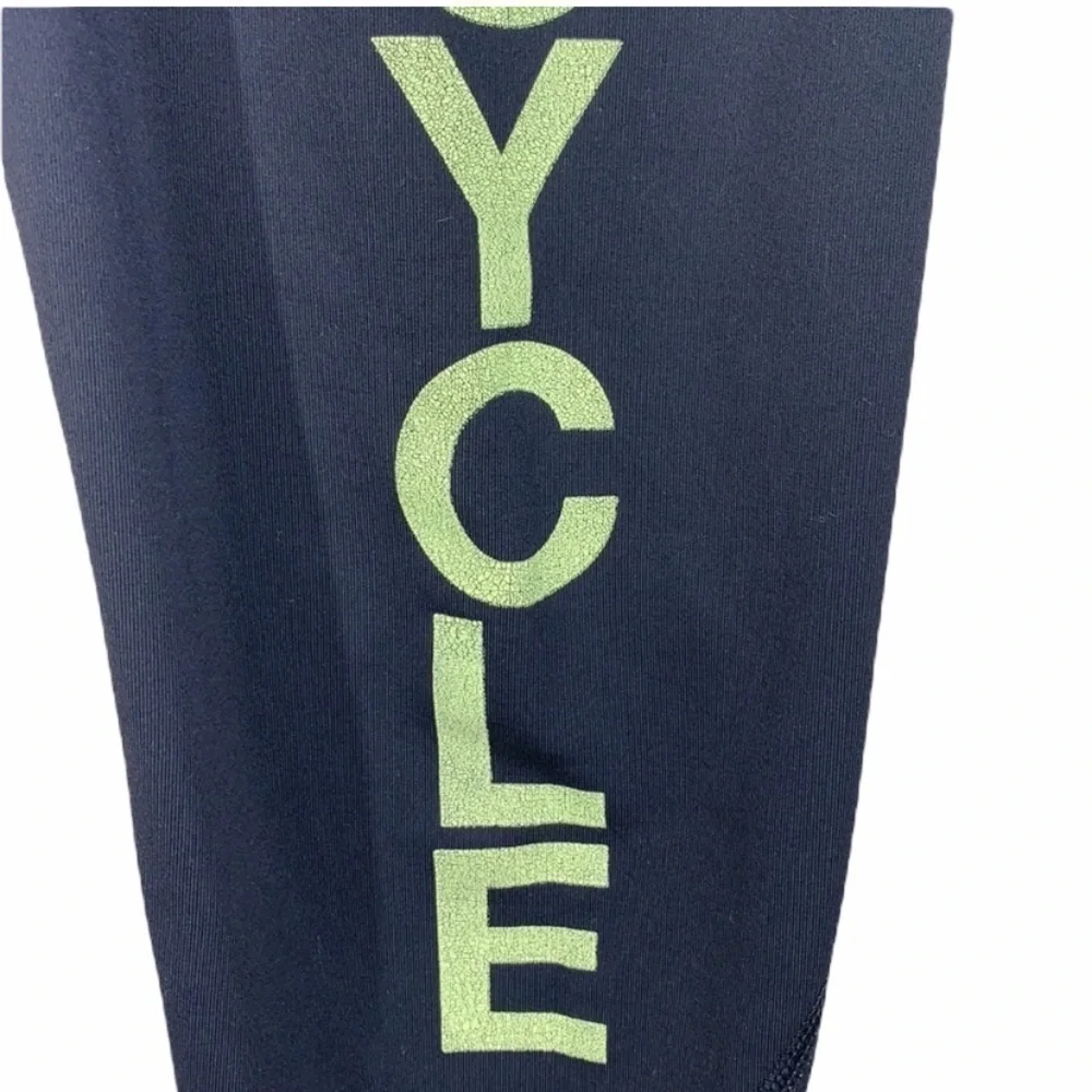 Lululemon black and yellow skull soul cycle crops